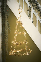 Lampki sznurkowe z 20 złotymi gwiazdkami do wewnątrz Ib Laursen