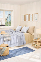 Lampa stołowa Sea z szklaną podstawą i kremowym kloszem z juty Ib Laursen